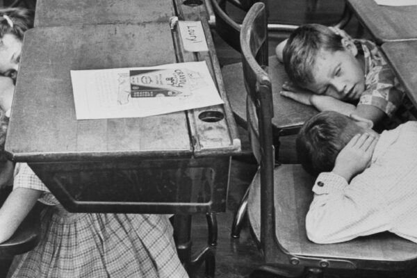 Duck and Cover: Civil Defense Drills in 1950s American Schools Through Photographs and Newsreels